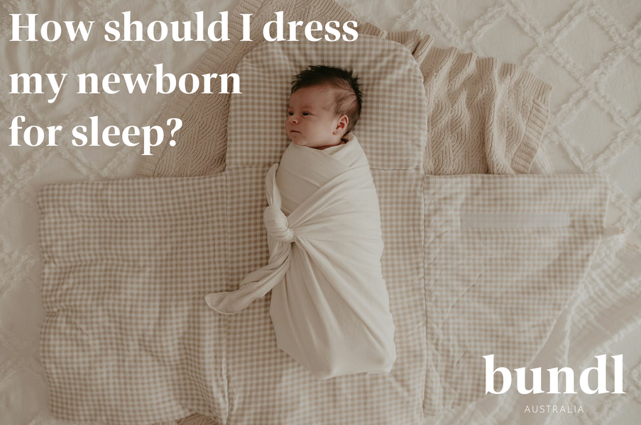 How should I dress my newborn for sleep?