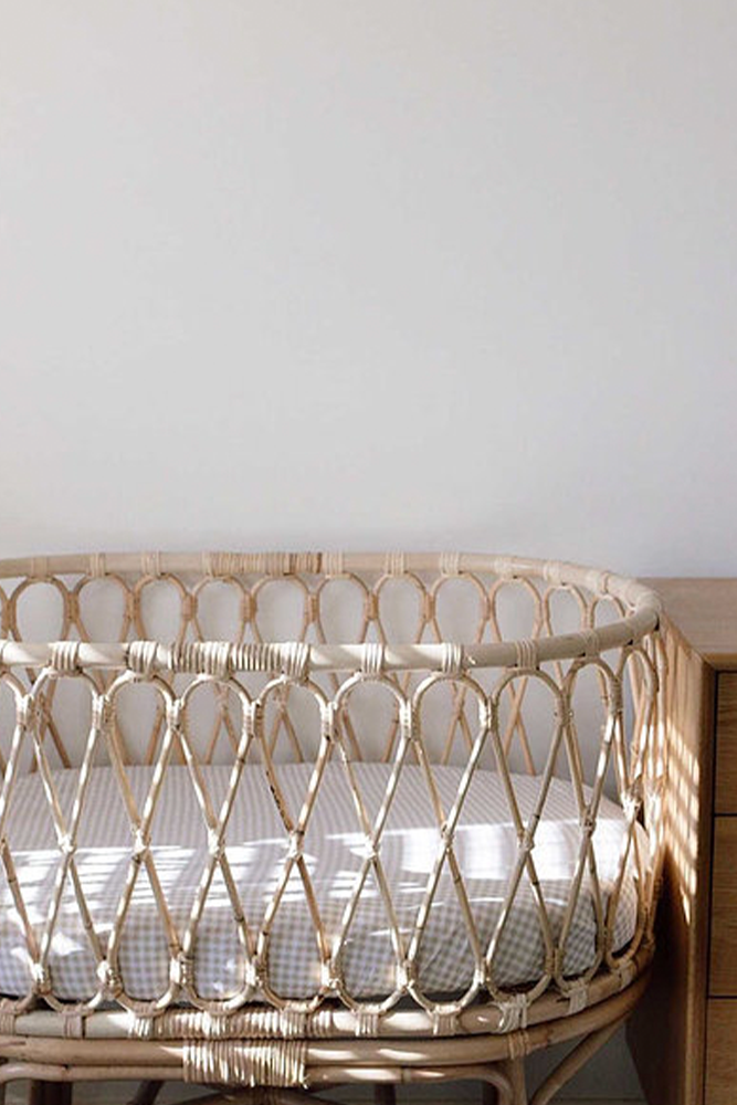 rattan cane bassinet with gingham fitted sheet 