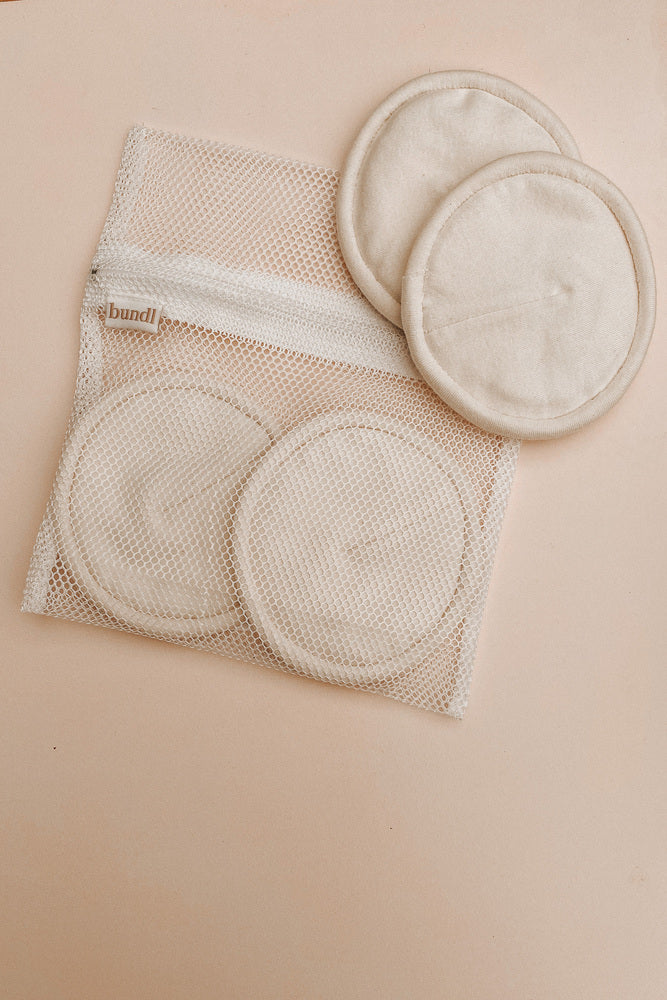 Reusable wool nursing pads with mesh wash laundry bag